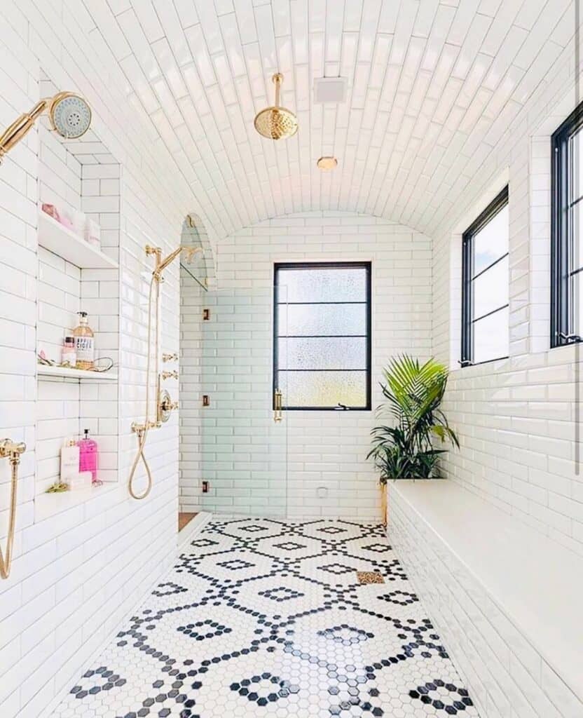 Gold Faucets in Subway Tile Shower