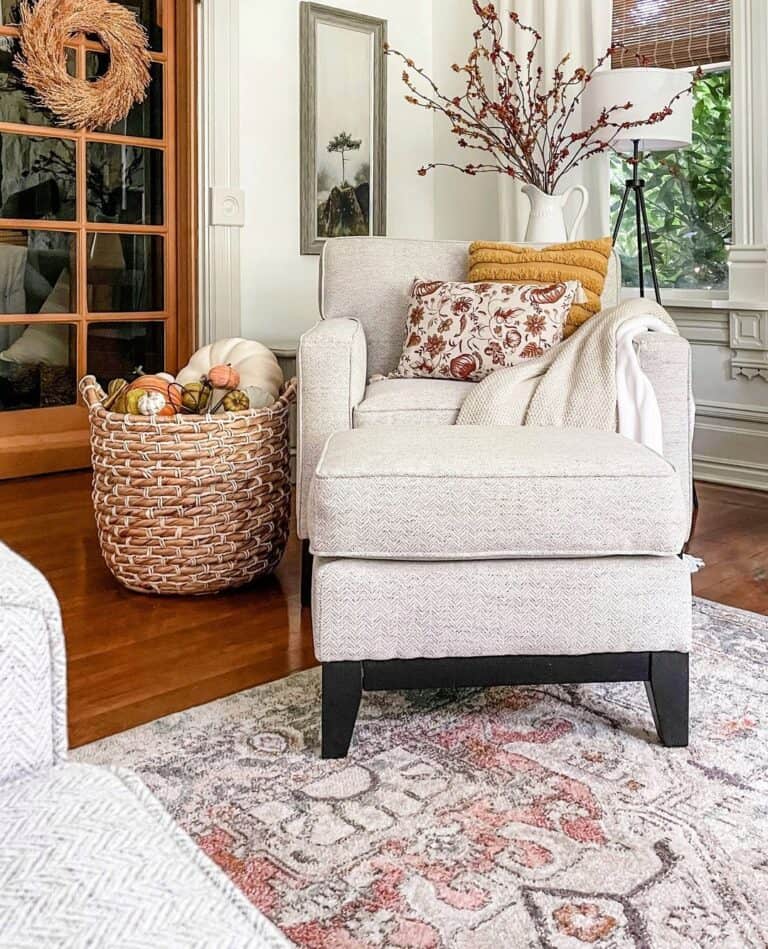 Gray Armchair with Fall Pumpkin Basket