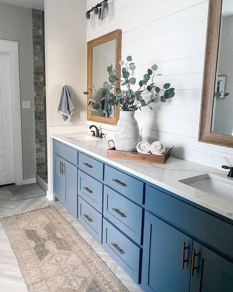 Grey Accents in Blue Vanity Bathroom