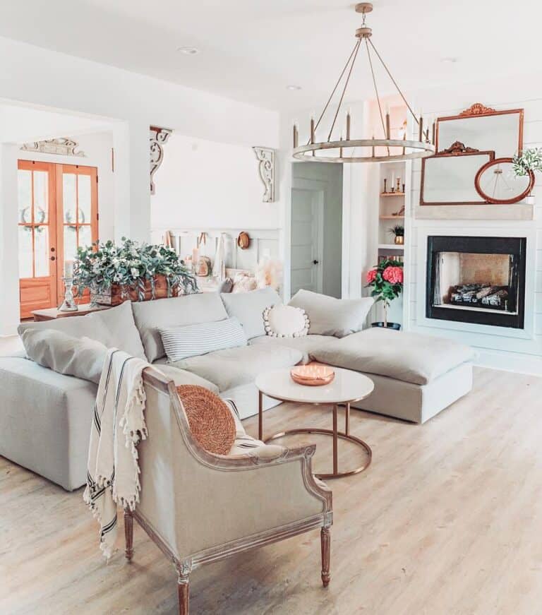 Grey Couch Living Room with Shiplap Fireplace