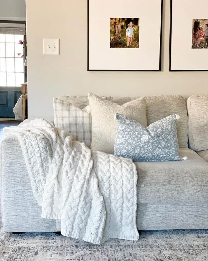 Grey Couch with Gallery Wall