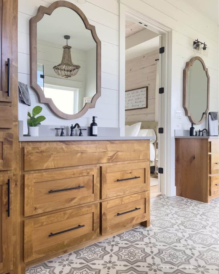 Identical Wood Vanities Surround Bathroom Doorway