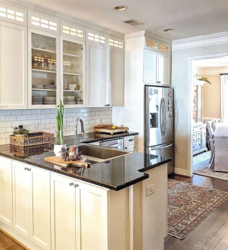 Kitchen Peninsula with Beige Cabinets