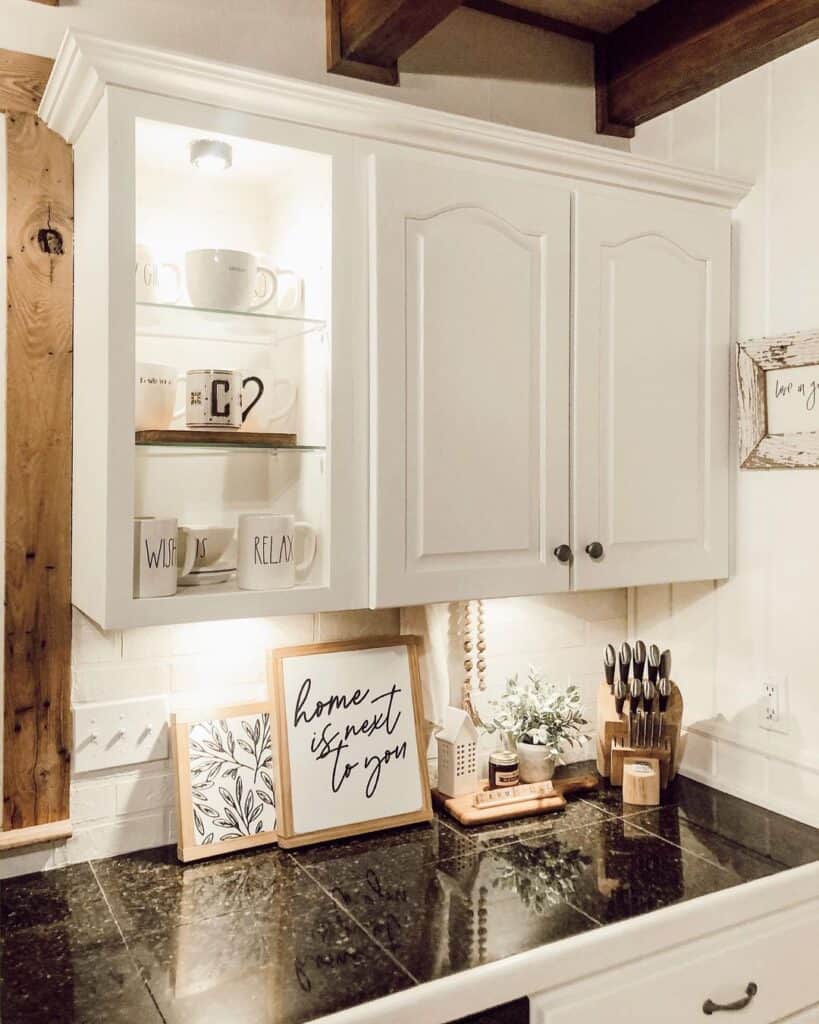 Kitchen Signs On a Black Tile Counter