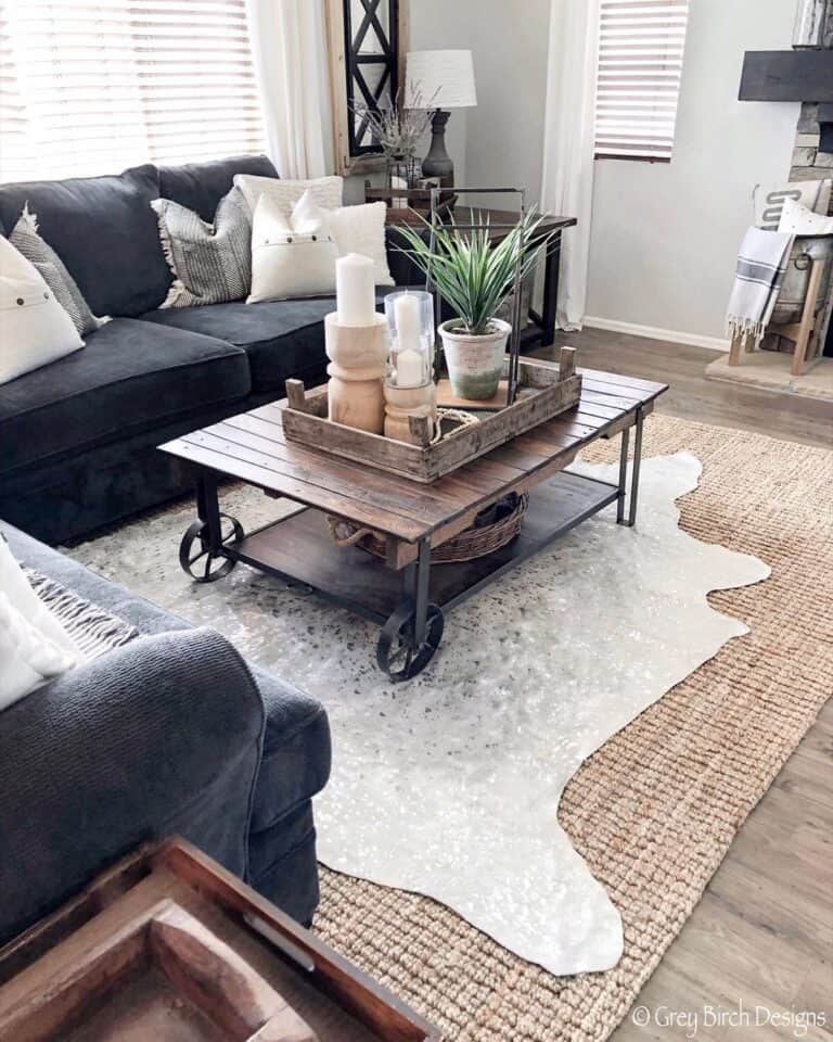 Layered Rugs Under Rustic Coffee Table