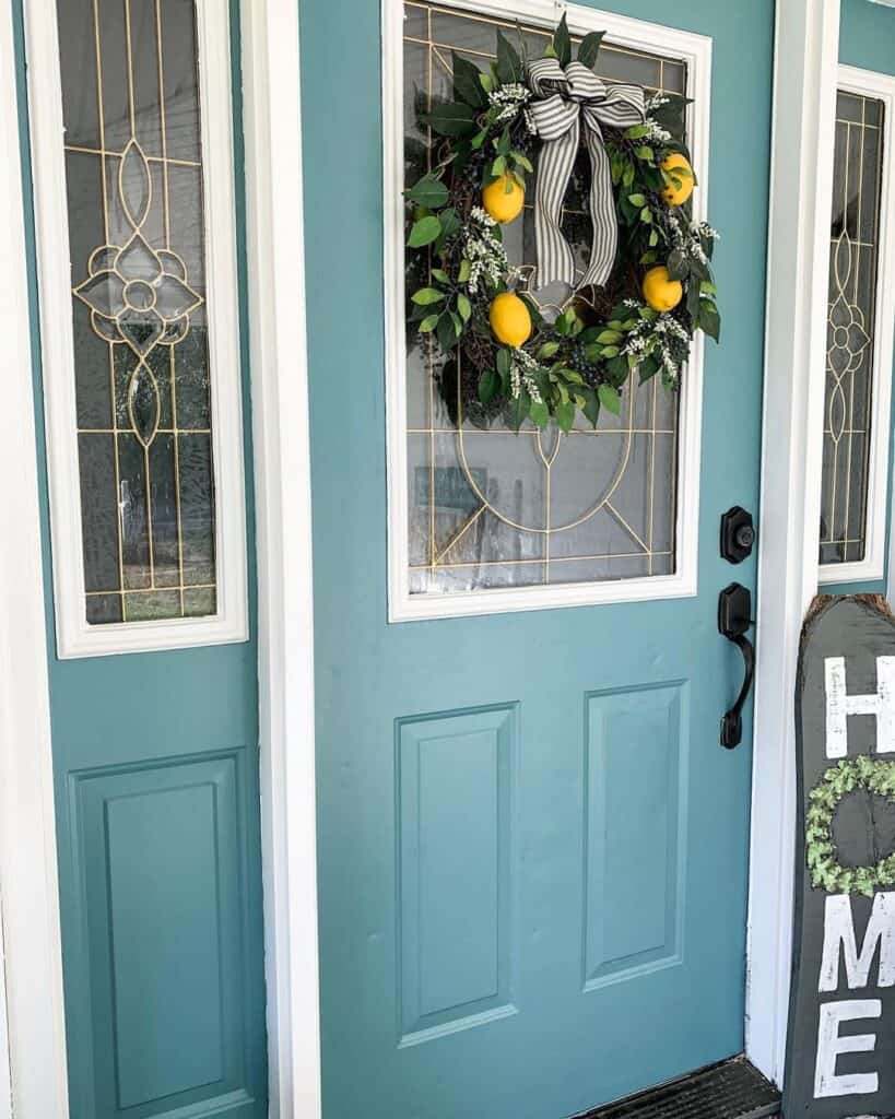Lemon Wreath on a Blue Front Door With Glass