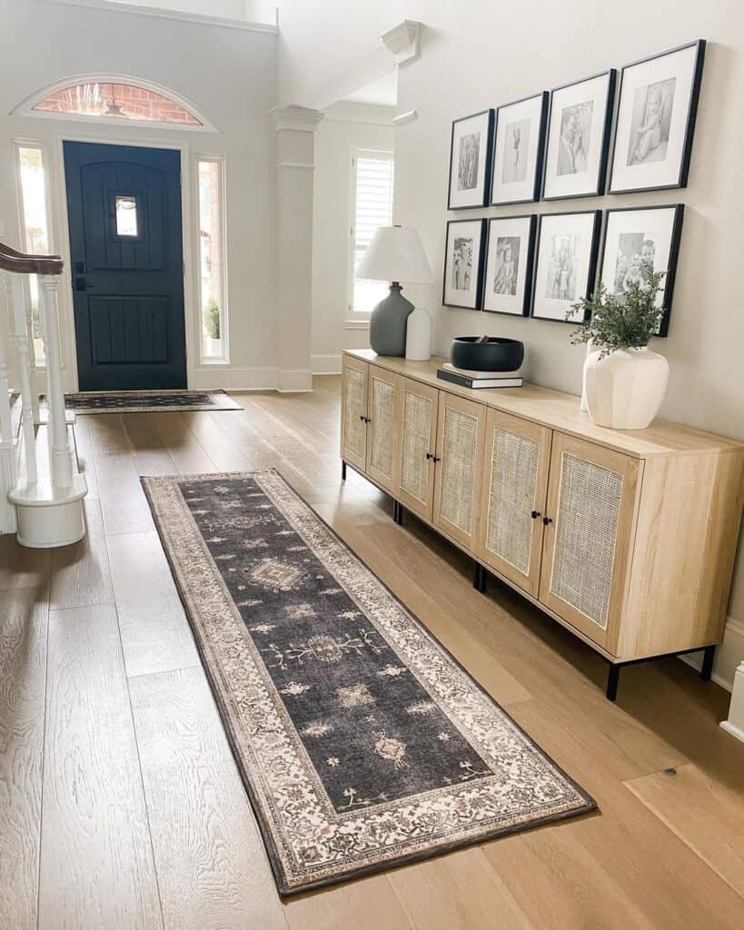 Light Wood Entryway Table and Black Front Door