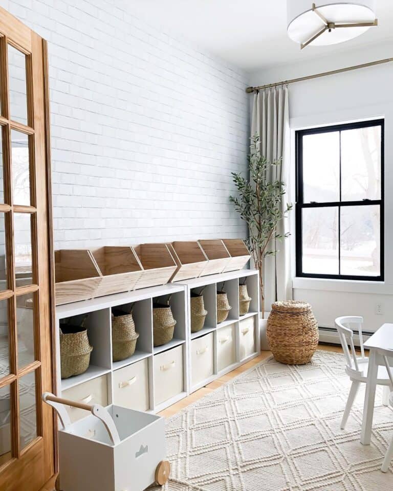 Low Playroom Storage Unit Against a White Shiplap Wall