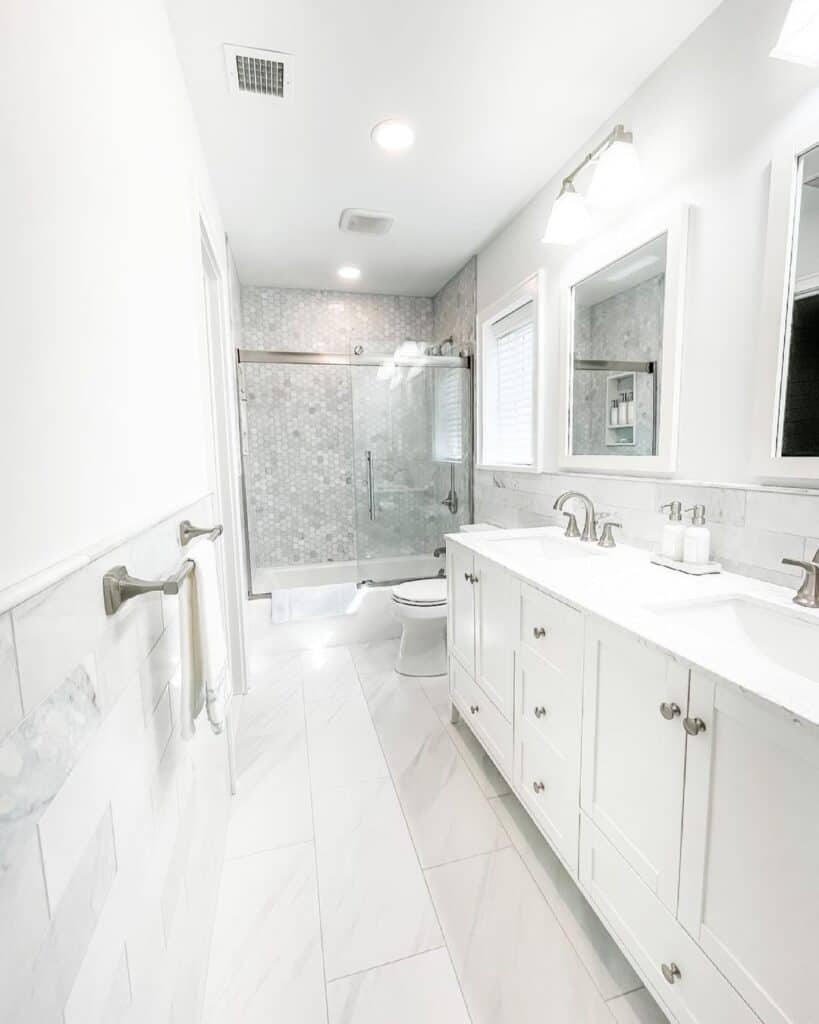 Marbled Tile Half Wall and White Vanity