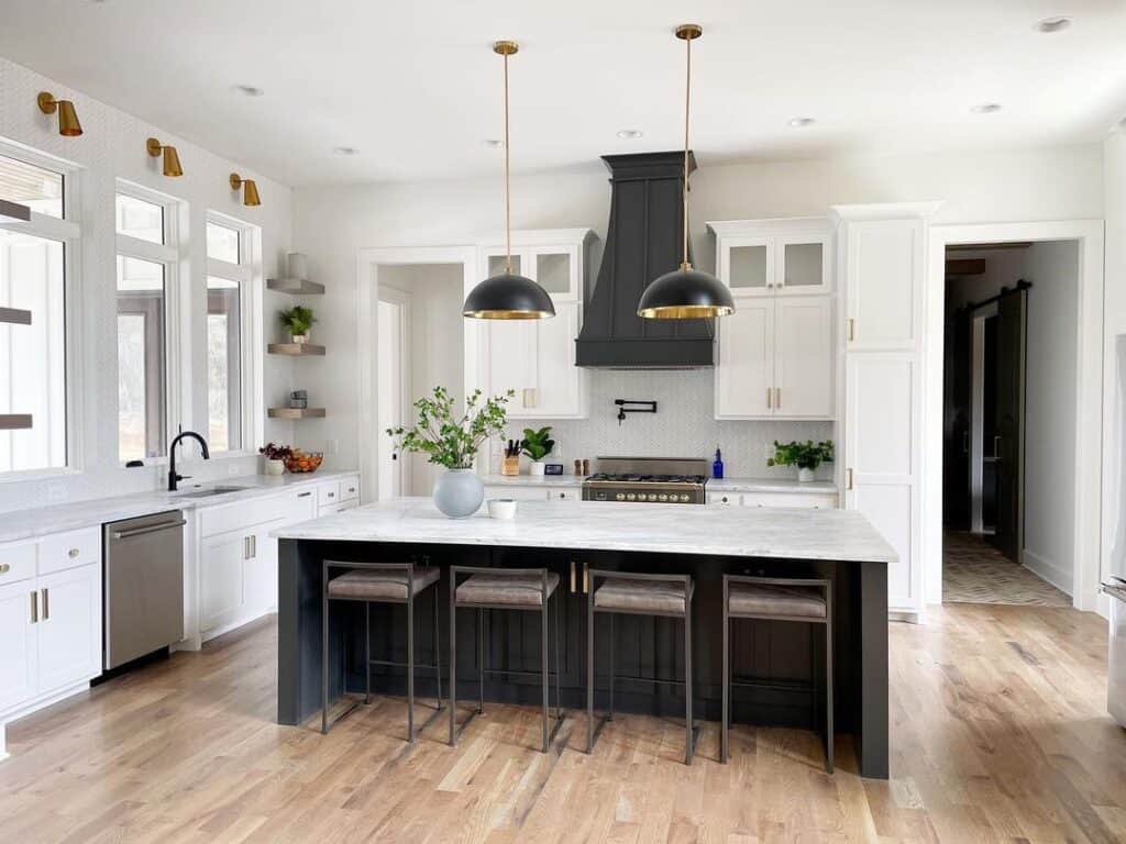 Matte Black Range Hood Between White Cabinets