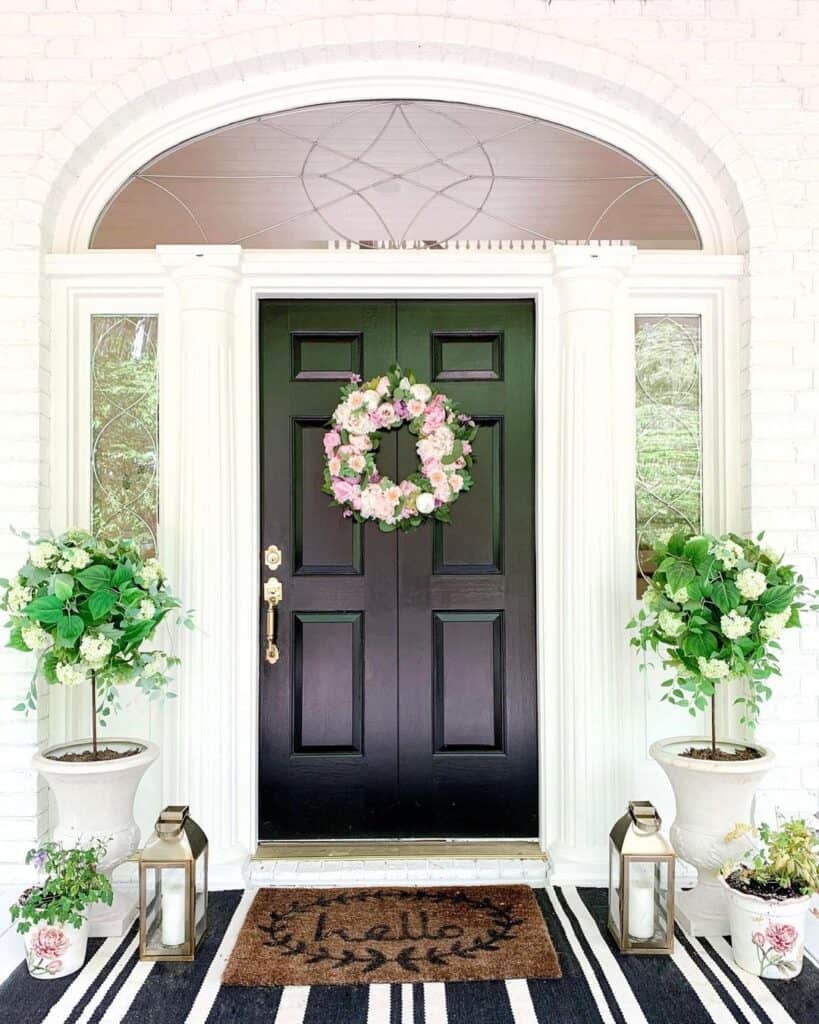 Modern Black Front Door with Decorative Planters