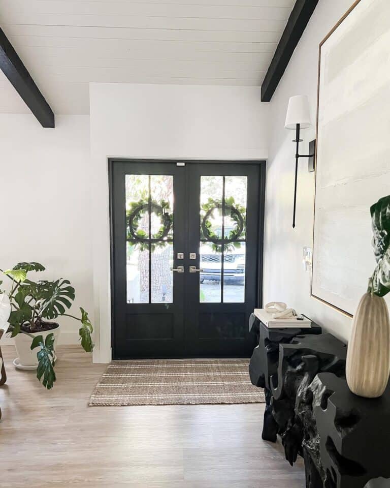 Monochrome Entryway with Foliage Accents