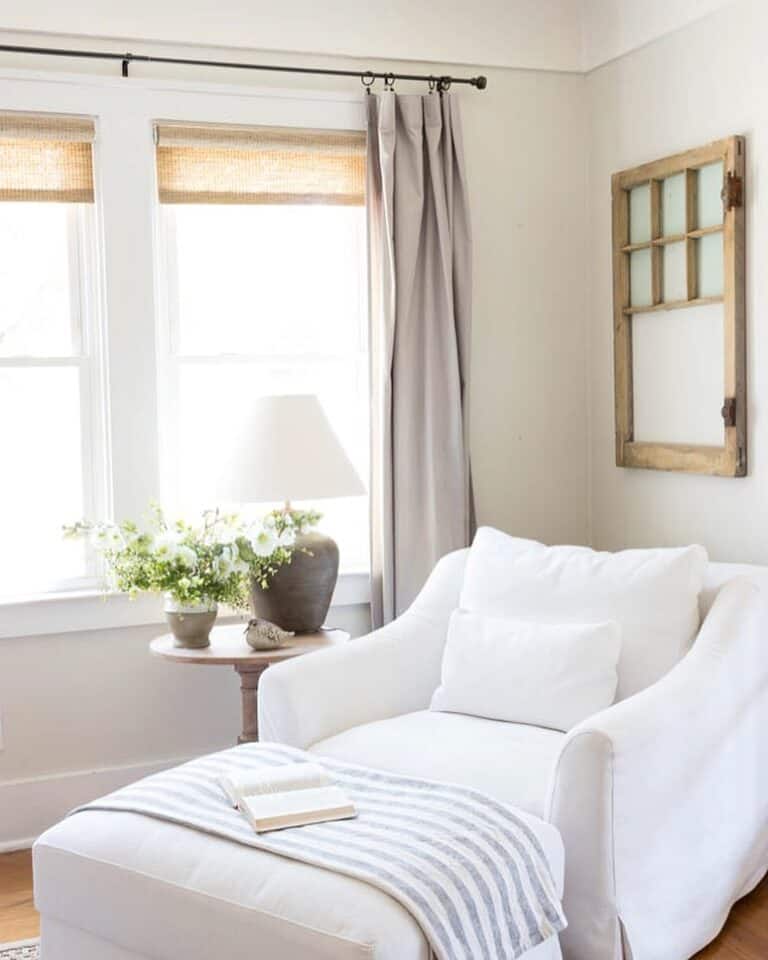 Natural Wood Window Pane Above a White Armchair