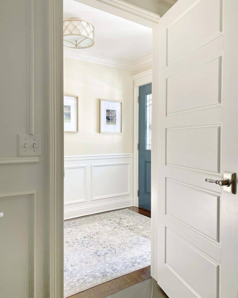 Neutral Hallway with White Wainscoting