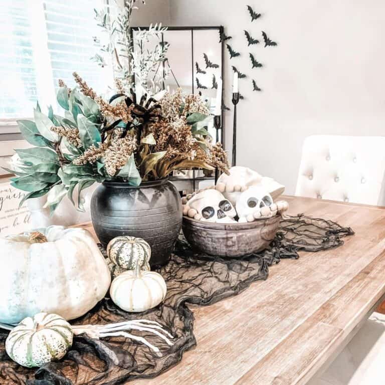 Neutral Living Room with White Skull and Pumpkin Table Decor