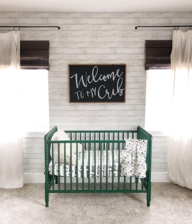 Neutral Room with Green Crib