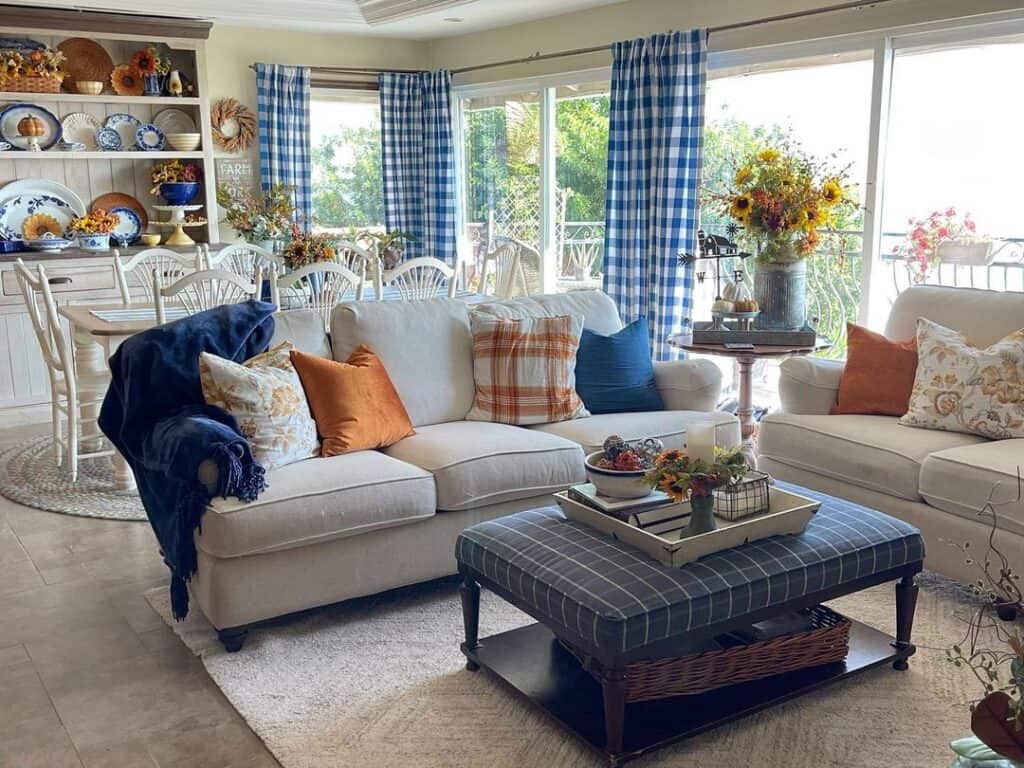 Orange and Blue Throw Pillows and Blue Buffalo Check Curtains