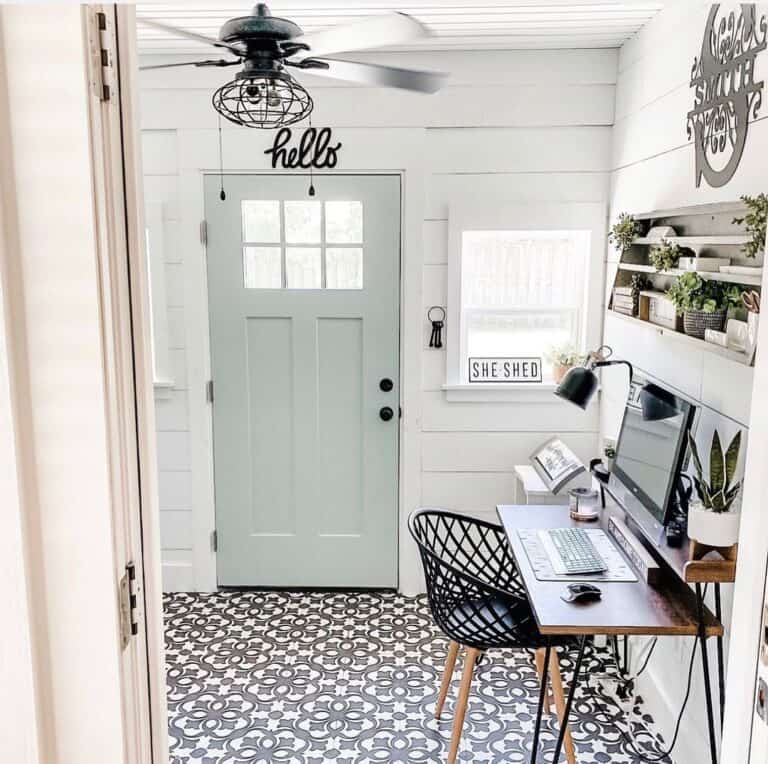 Ornate Black and White Tile Floor in a Home Office
