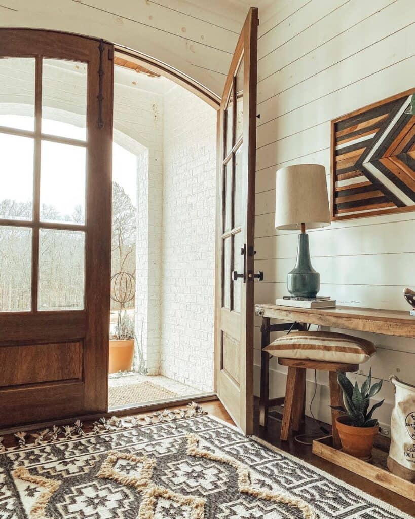 Patterned Rug in Arched Door Entryway