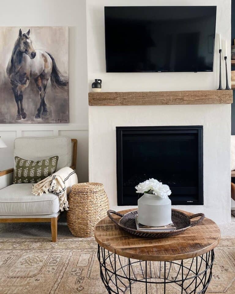 Picture of a Horse Next to a White Fireplace
