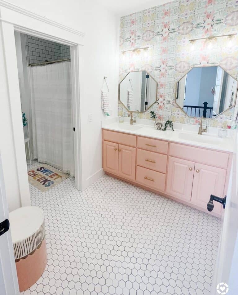 Pink Bathroom Décor with Ornate Wallpaper