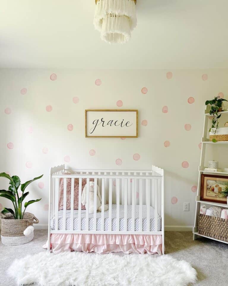 Pink Polka Dot Wallpaper and White Crib