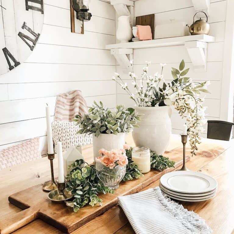 Pink and White Flowers with Foliage in White Vases