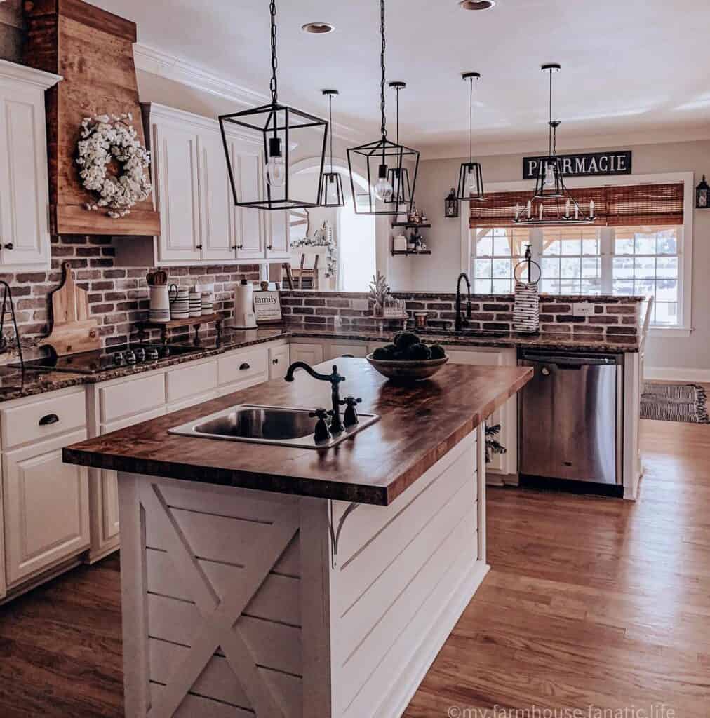 Red Brick Backsplash and a Brown Countertop