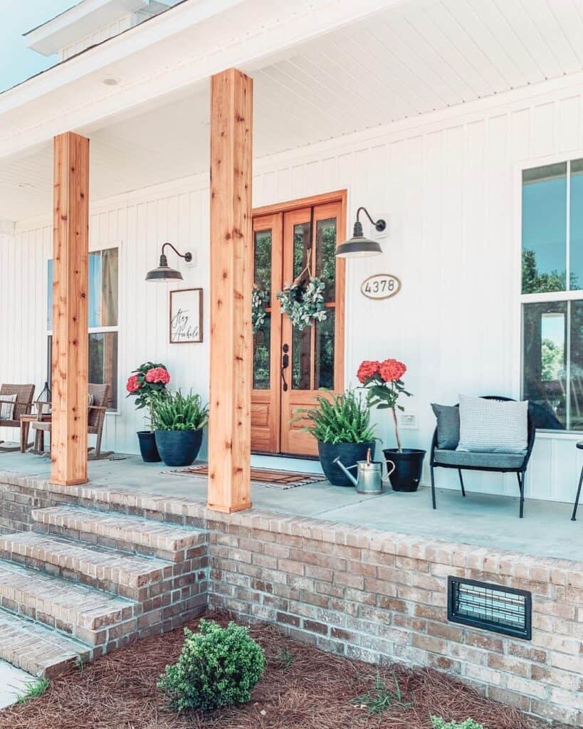 Red Flowers Under Modern Farmhouse Outdoor Lighting