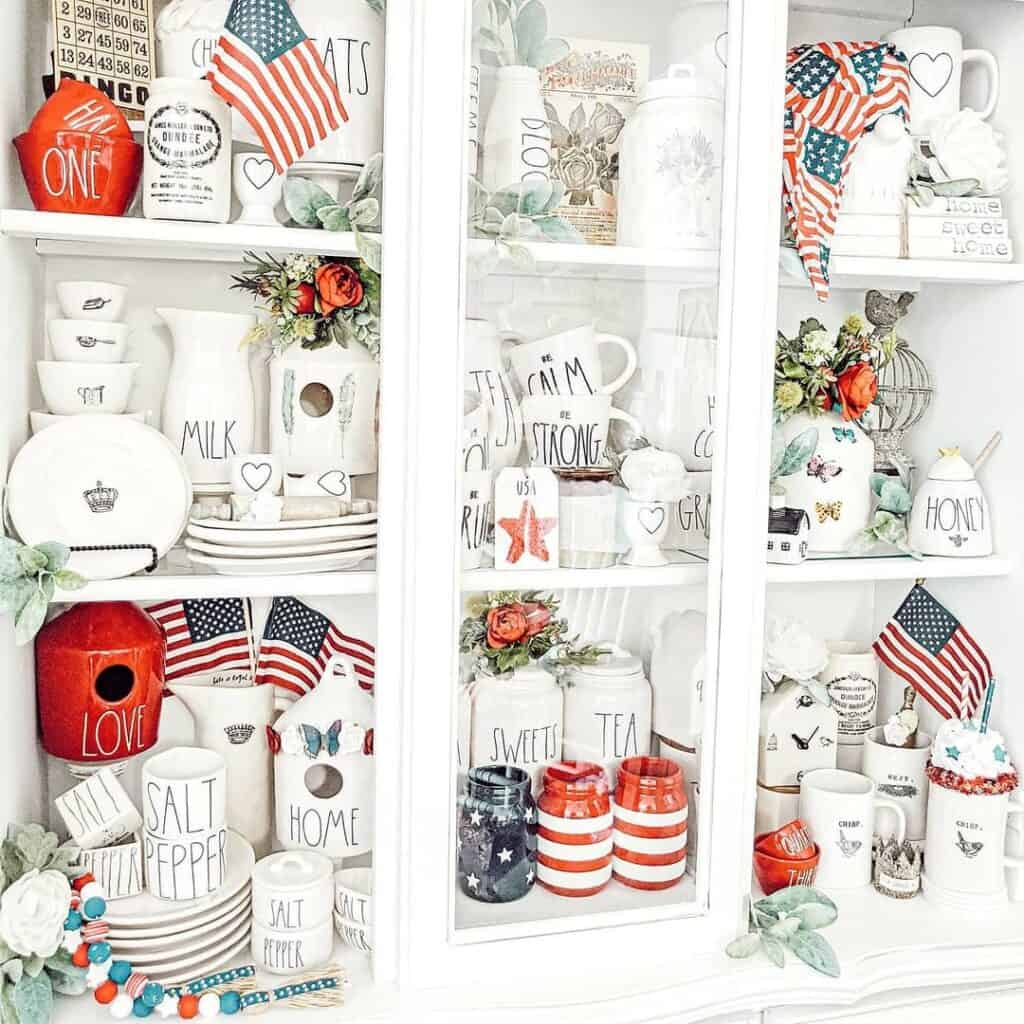 Red Kitchen Accents Including American Flags and Red Flowers