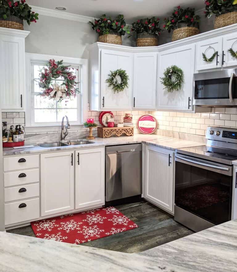 Red Kitchen Decor on Grey Marbled Countertops