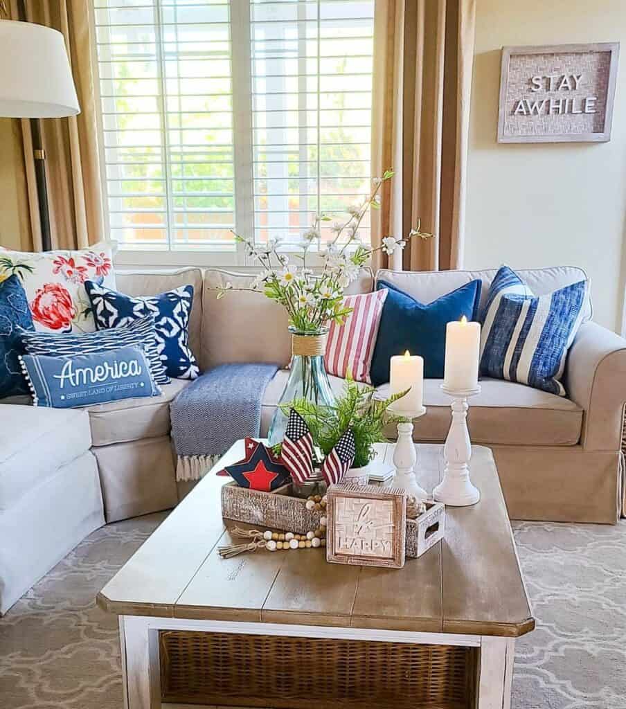 Red and Blue Throw Pillows on a Beige Couch