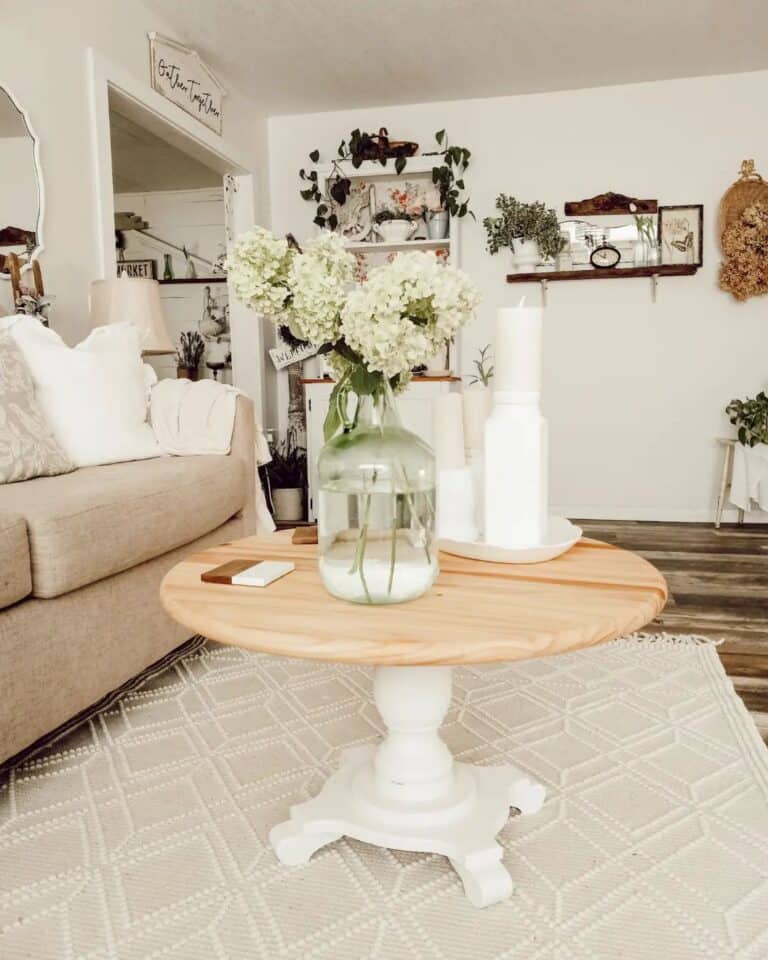 Round Rustic Coffee Table with White Hydrangeas