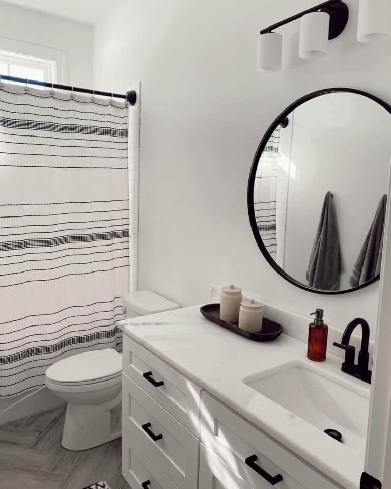 Shower with Window Inside with a Striped Curtain