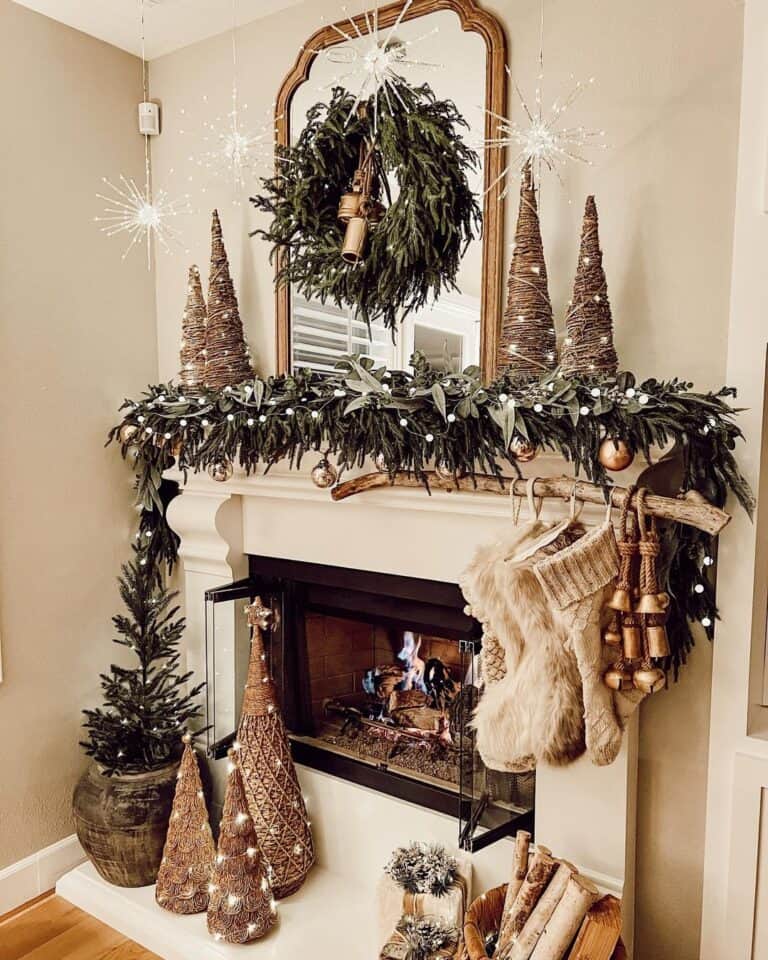 Silver Stars and Beige Stockings Hanging Over a White Hearth
