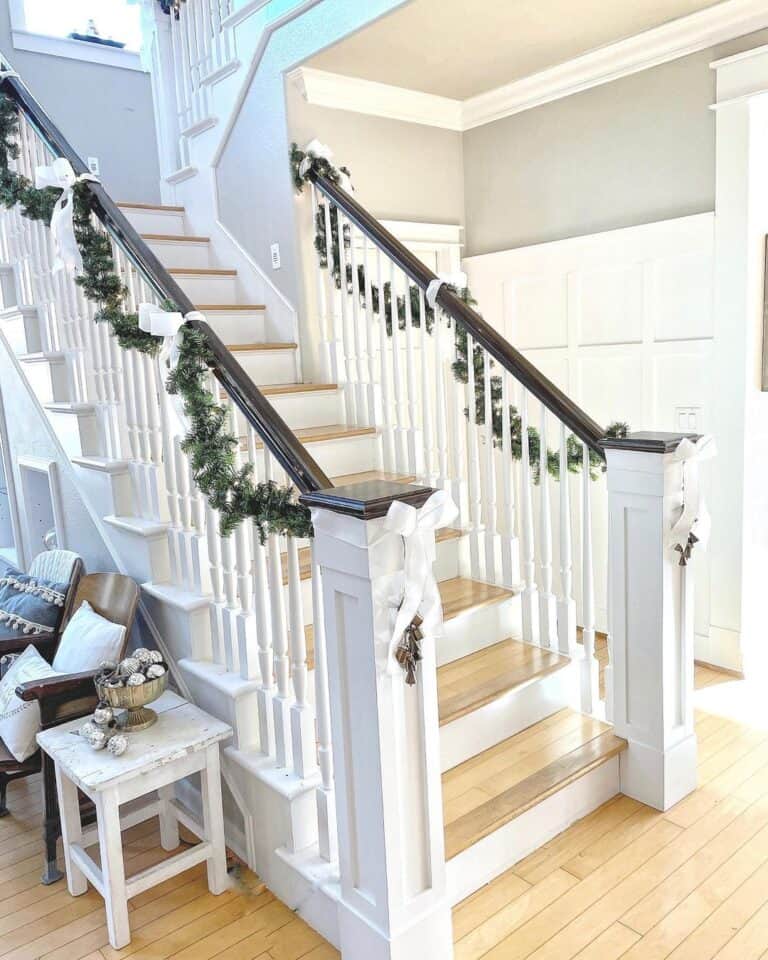 Simple Christmas Décor for Wood and White Stairs