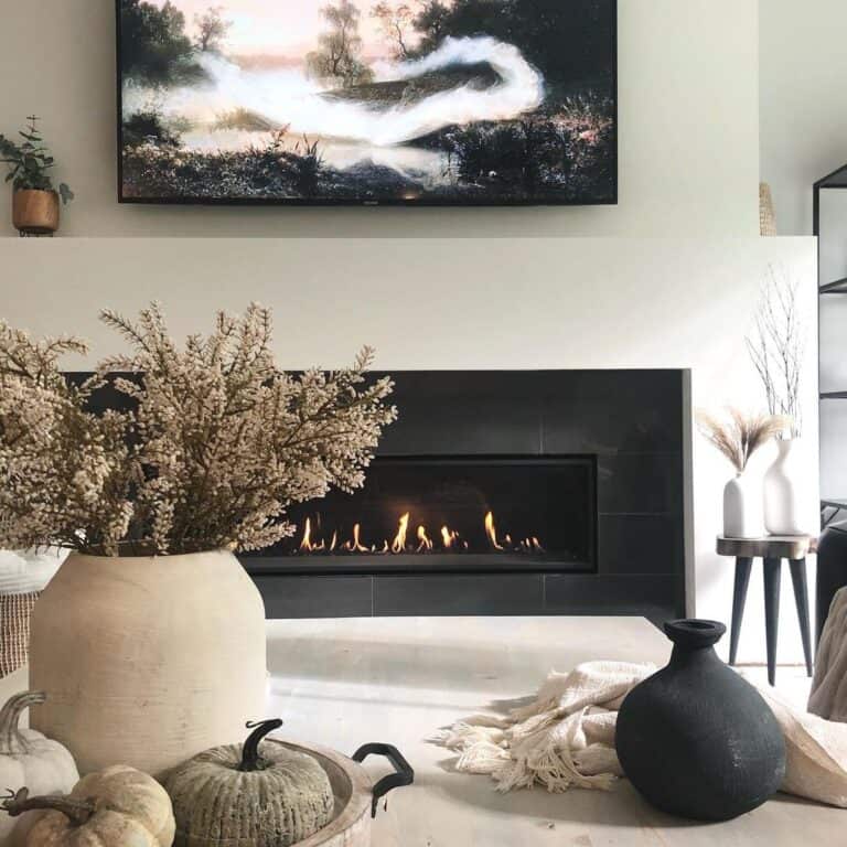 TV Art Above a Black Fireplace