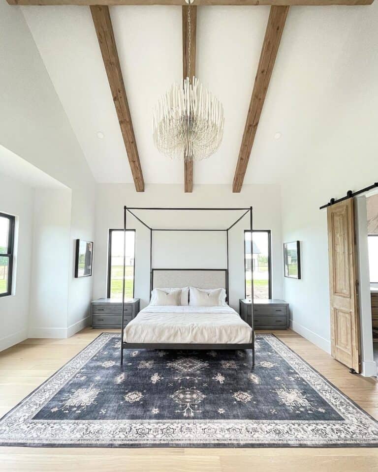 Vaulted Ceiling Bedroom with a Black Four-Poster Bed