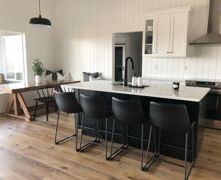 Vertical Shiplap Kitchen With Black Stools