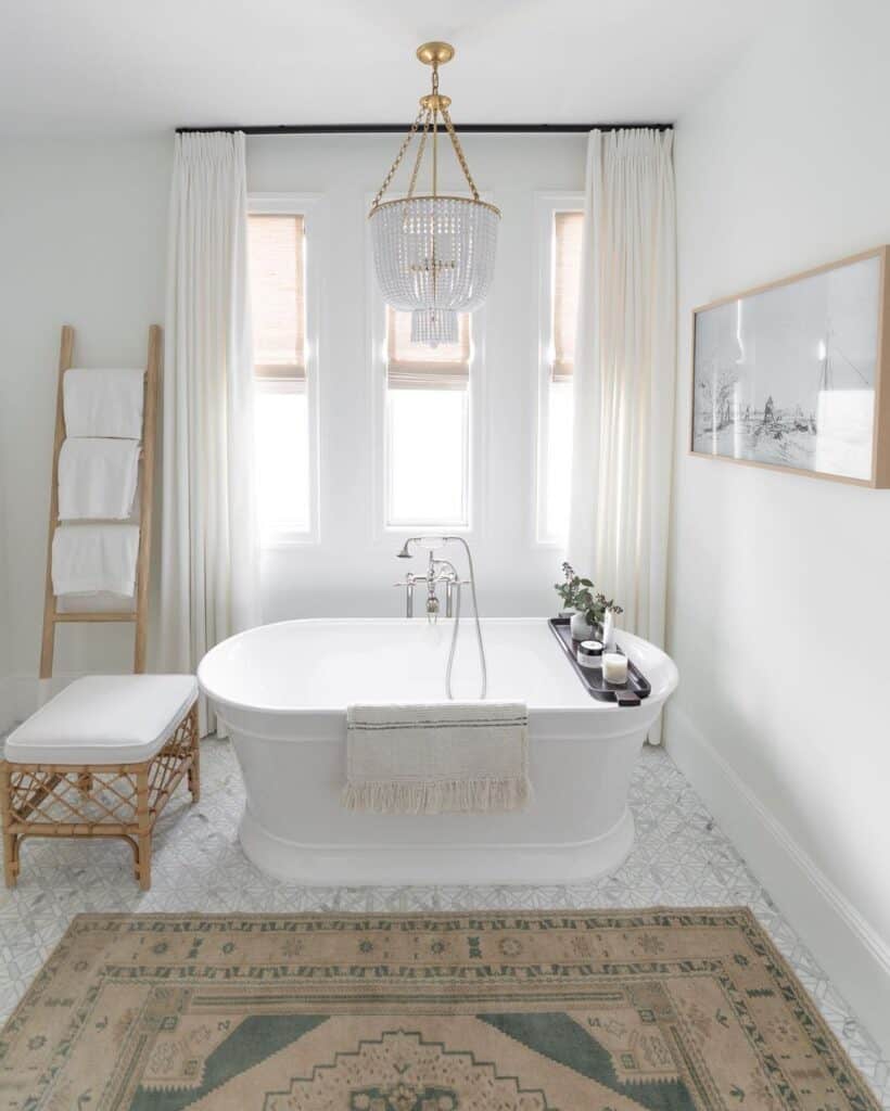 Vertical Windows and White Freestanding Tub
