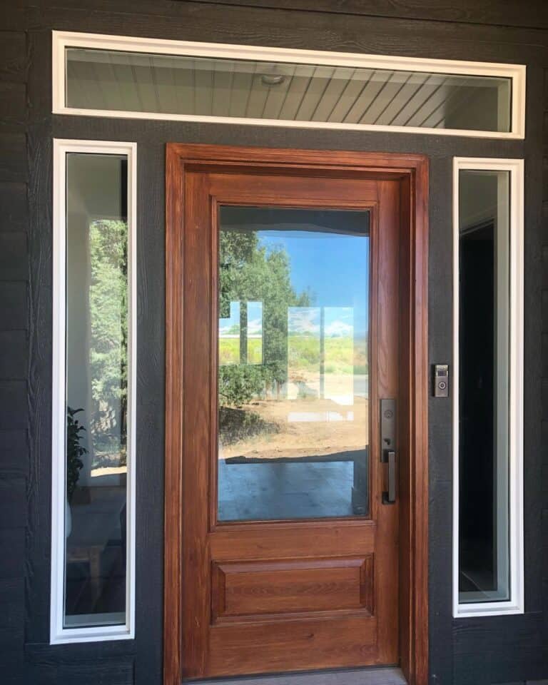 Warm Wood Glass Front Door With Sidelights and a Transom