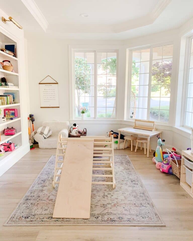 Well-Lit Playroom with Tall White Shelves