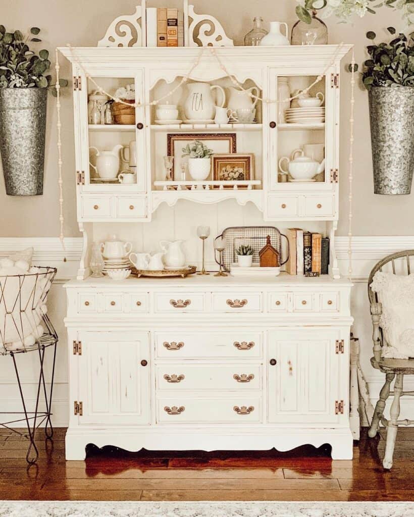 White Antique Hutch with Beaded Garland