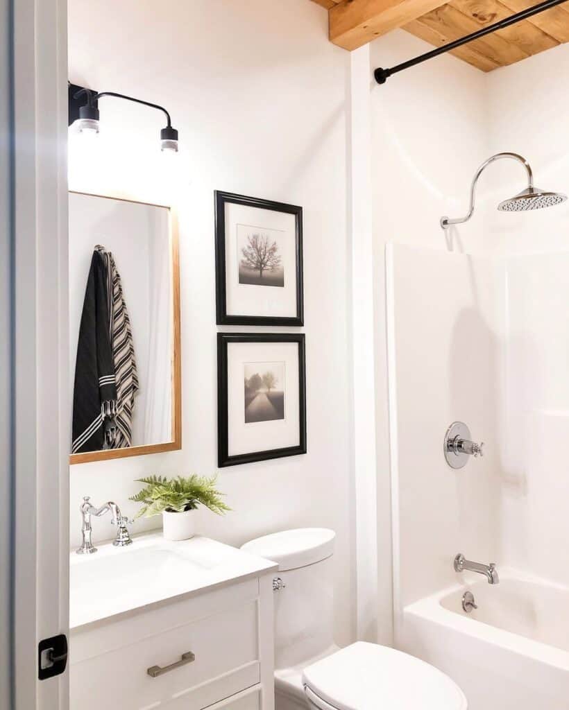 White Bathroom Walls and Chrome Faucets