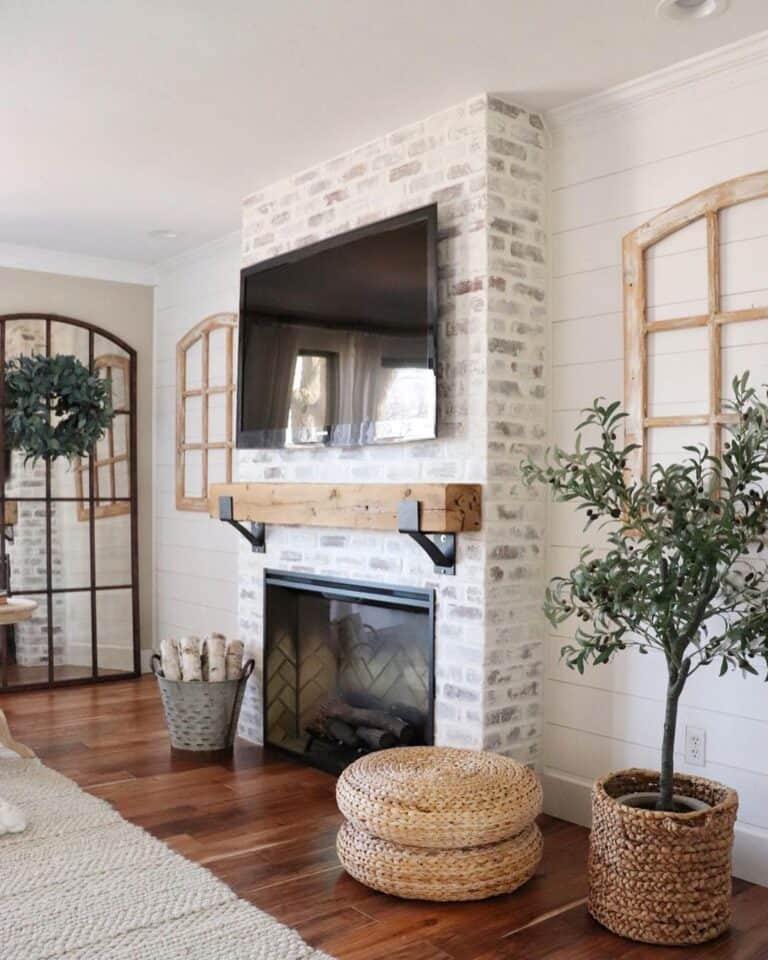 White Brick Living Room Fireplace and Window Décor