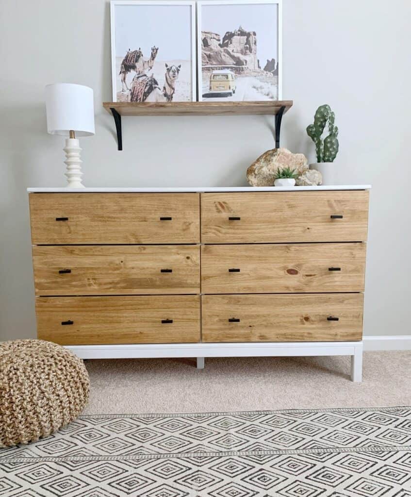 White Dresser With Warm Wood Drawers and Small Black Handles