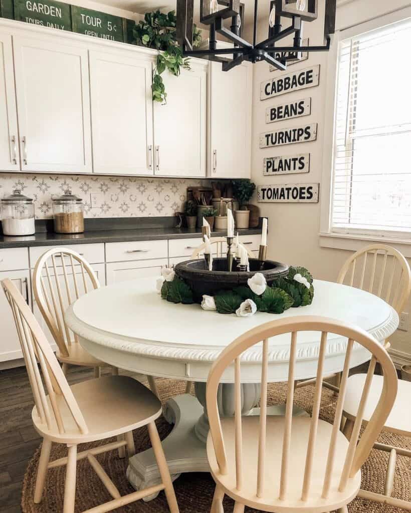 White Farmhouse Table With Vintage Chairs