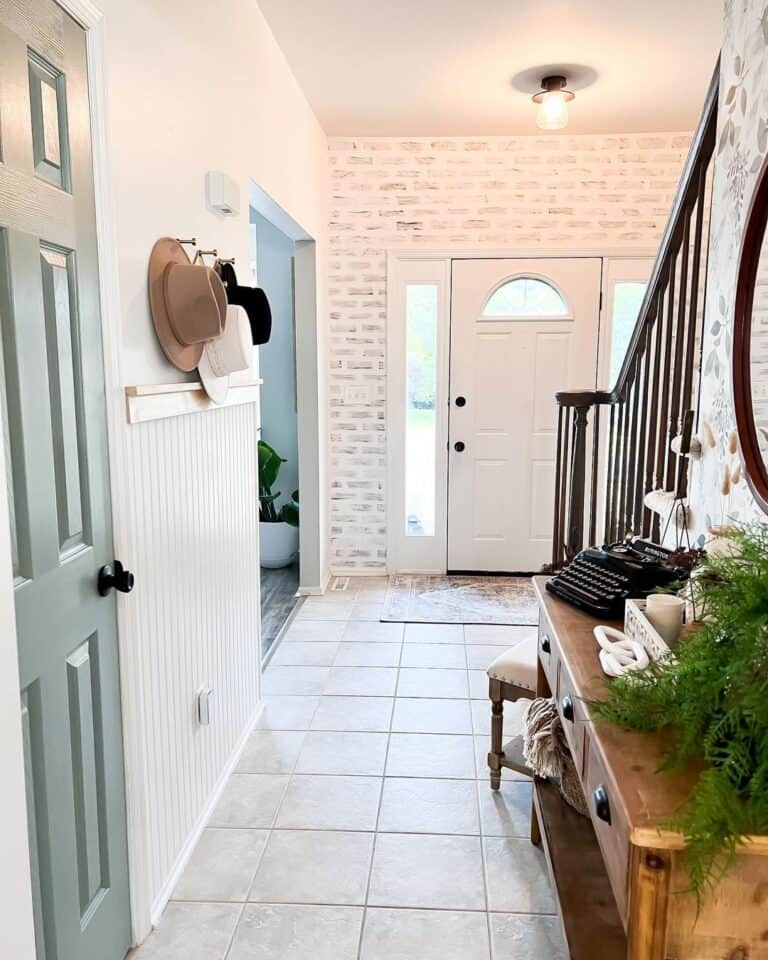 White Front Door on a Brick Entryway Wall