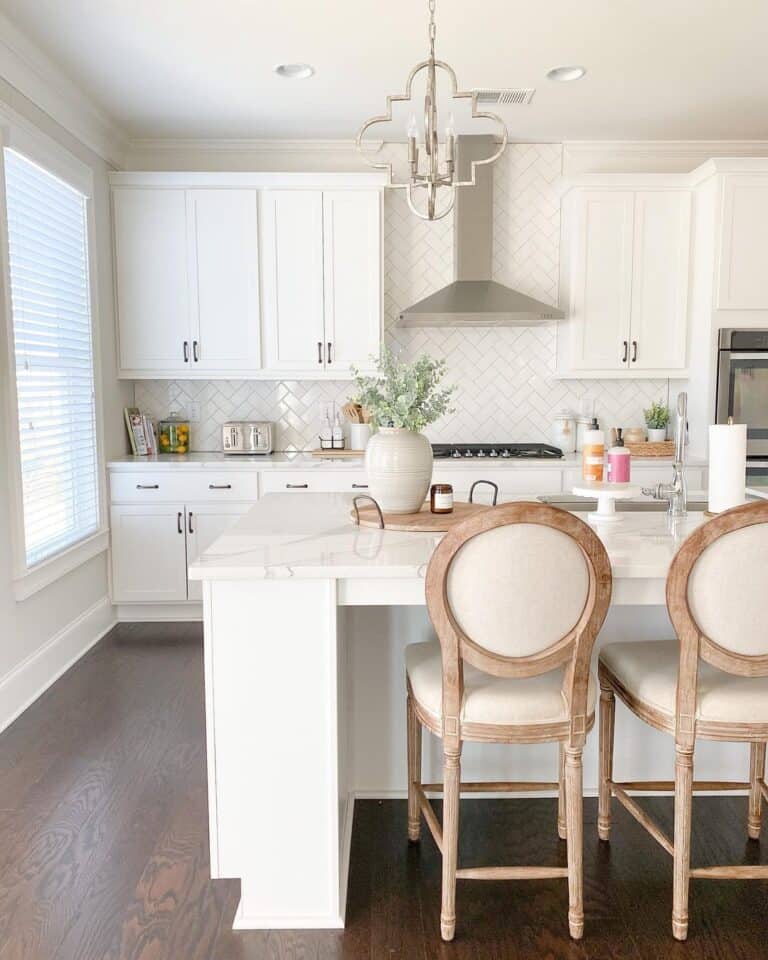 White Herringbone Backsplash and a Dark Wood Floor