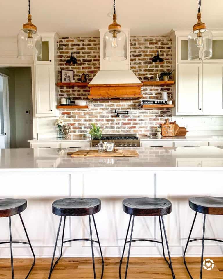 White Kitchen Island with Wood and Metal Bar Stools